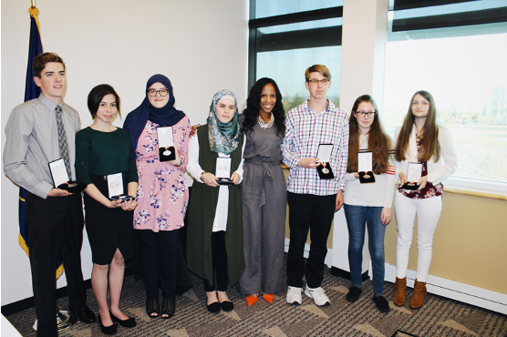 beehive technology school students accepting awards
