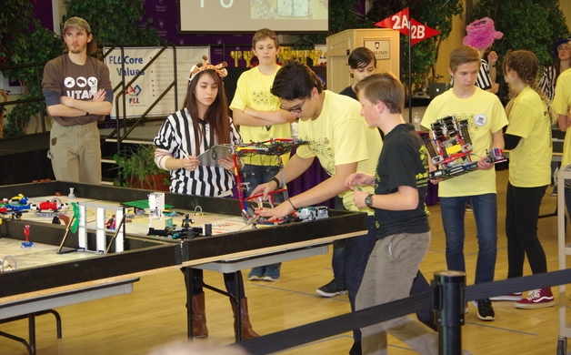 BSTA Robotics Team Working on Their Robot during the Competition